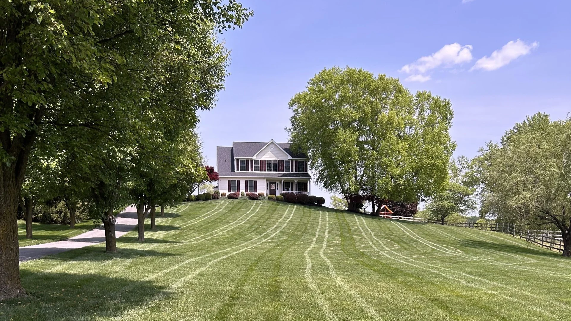 Finksburg, MD home with lush green grass.