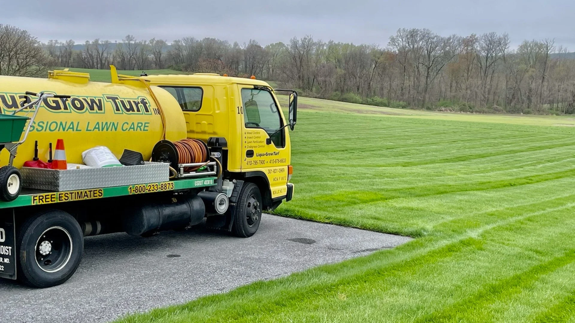 Lawn care and pest control company truck.