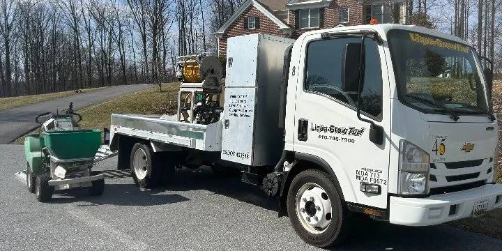 Liqua-Grow Turf truck and green fertilizer spreader.